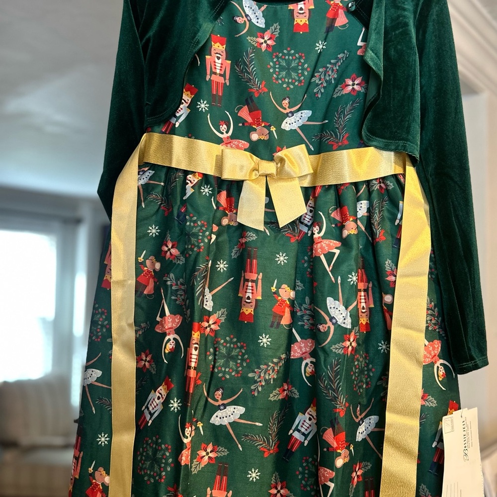 Festive Green Dress with Nutcracker Print and Gold Bow